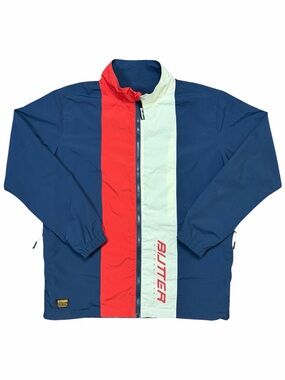 Butter Goods Navy Windbreaker with Red and White Center Stripes